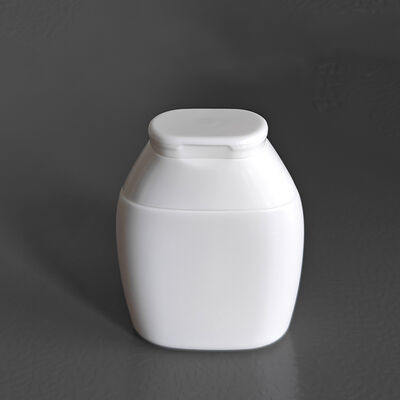 フリップトップキャップデザイン 40ml 60ml HDPE シャンプーとスキンケアのためのカスタマイズ可能な形状の化粧水ボトル