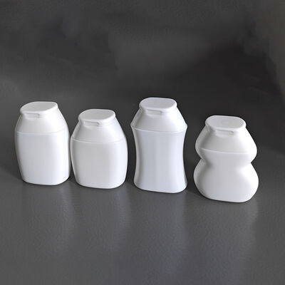 フリップトップキャップデザイン 40ml 60ml HDPE シャンプーとスキンケアのためのカスタマイズ可能な形状の化粧水ボトル